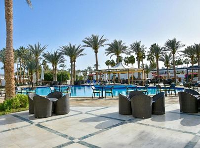 Отдых в Египте на песчаном пляже под пальмами в отеле  Seti Sharm Resort  4*
